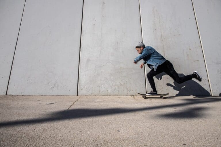 man skateboarding on the street