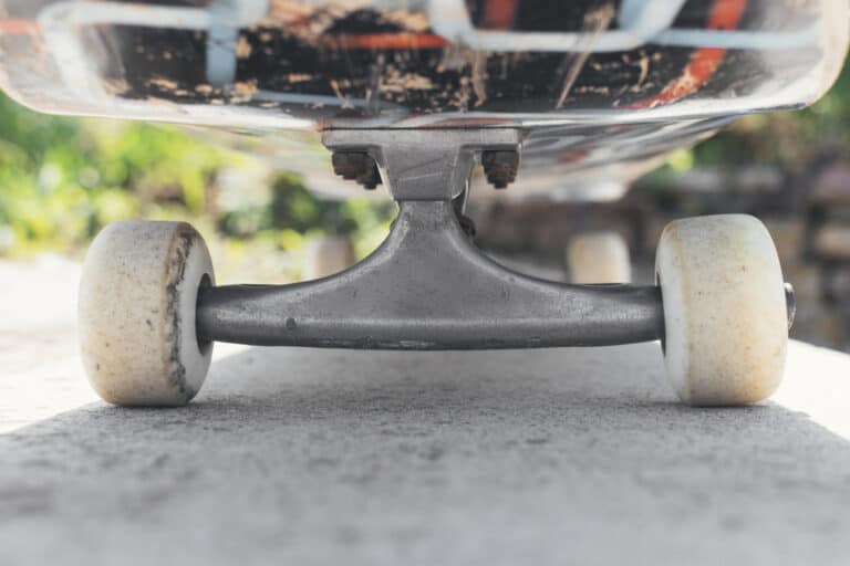 closeup of skateboard truck and wheels
