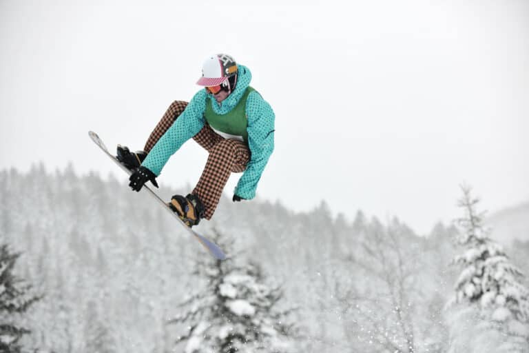 man on snowboard in the air